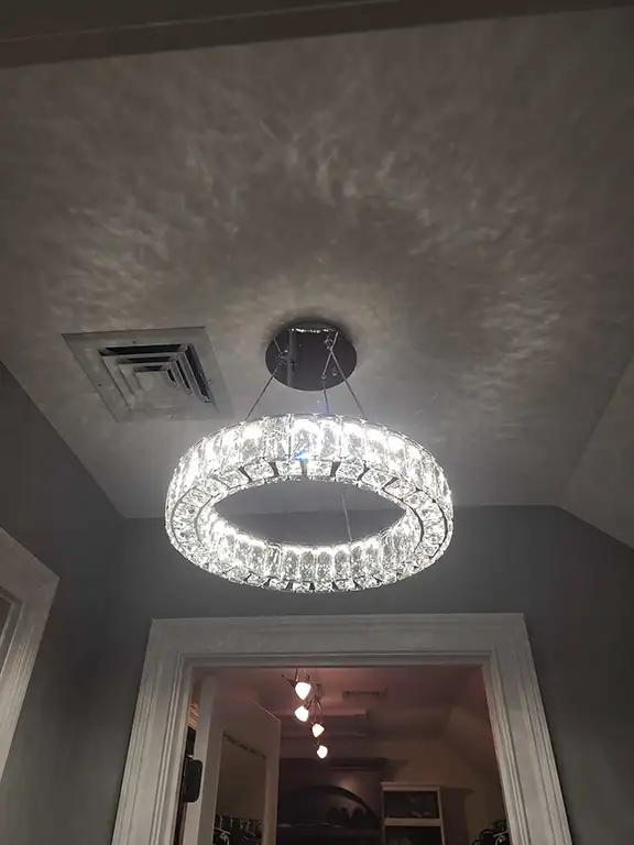 Modern crystal pendant light fixture with elegant ring design