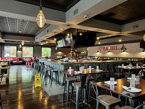 Commercial pizza restaurant with custom pendant lighting and electrical installation