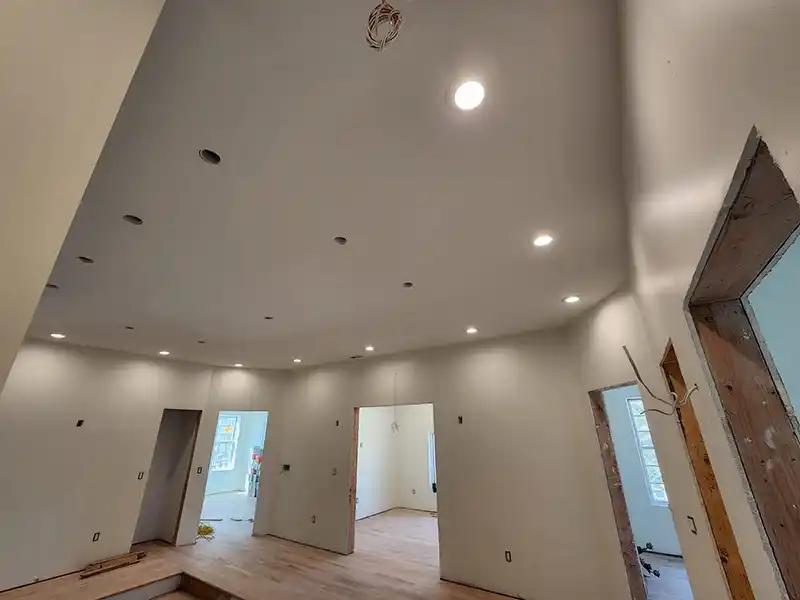 Recessed LED lighting installation in renovated room